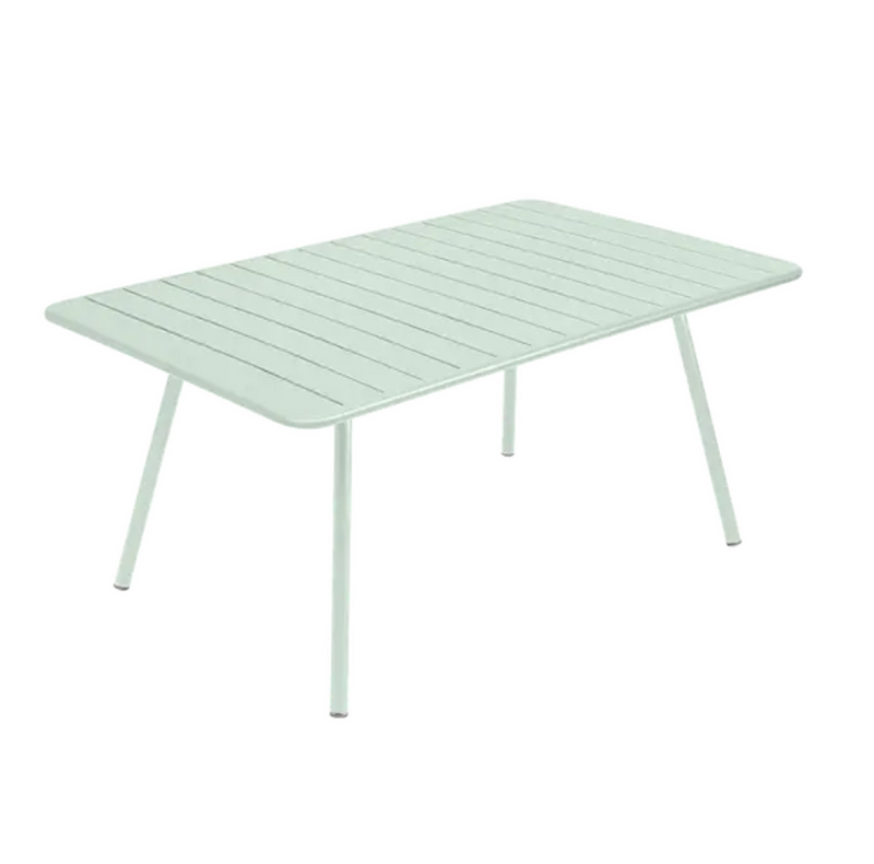 Load image into Gallery viewer, Ice mint Fermob Luxembourg outdoor metal table, 165 x 100 cm, showcasing a modern design perfect for outdoor dining and gatherings.
