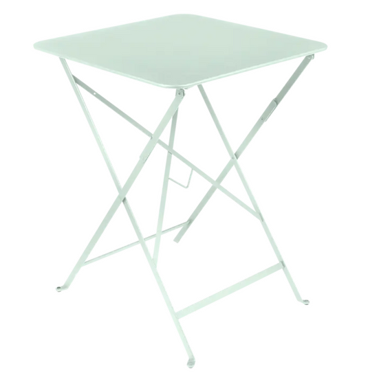 Ice mint Fermob foldable metal bistro table, 57x57 inches, outdoor cafe table with a sleek, modern design.