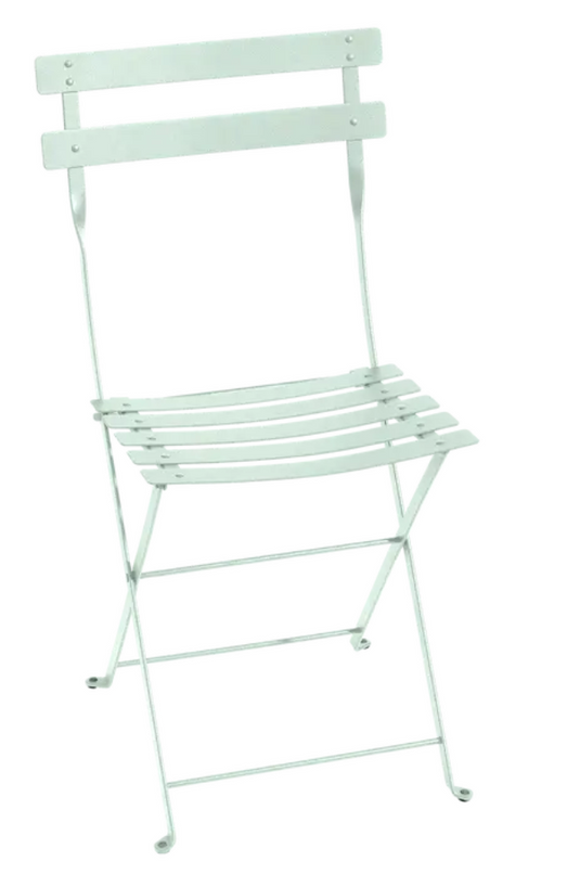 Ice mint Fermob Bistro metal folding chair with honey finish, suitable for outdoor cafe and patio seating.