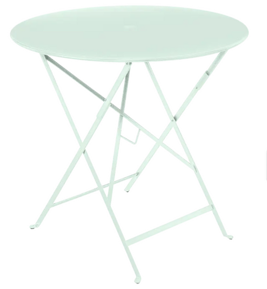 Vibrant ice mint Fermob round folding bistro table with Ø77cm metal top, perfect for outdoor terraces and small spaces.