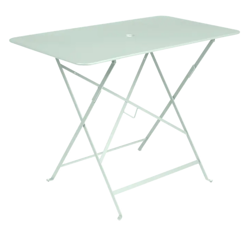 Load image into Gallery viewer, Light green Fermob metal foldable bistro table, 97x57 cm, ideal for outdoor cafes and small dining spaces.
