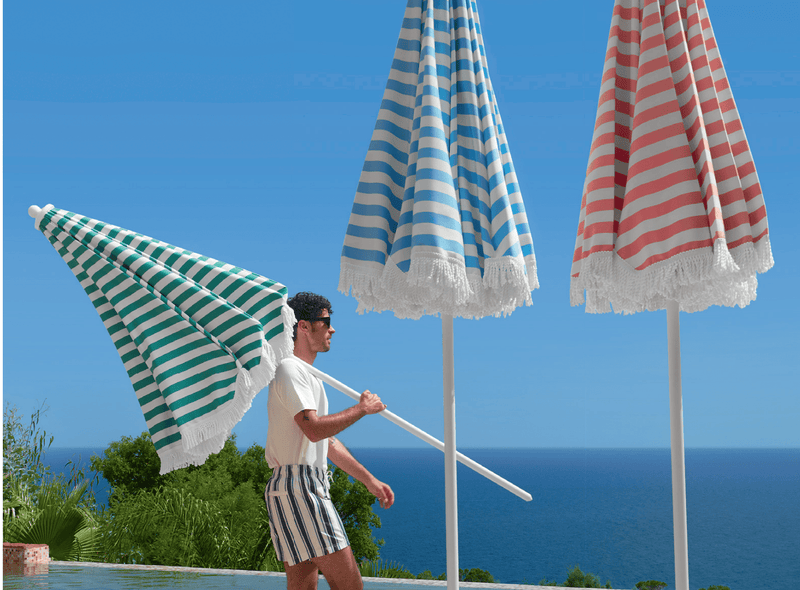 Load image into Gallery viewer, Fermob KOTO Teak Parasol in Ireland sizes Ø200cm and Ø250cm, featuring a stylish fringe detail on a natural teak finish.
