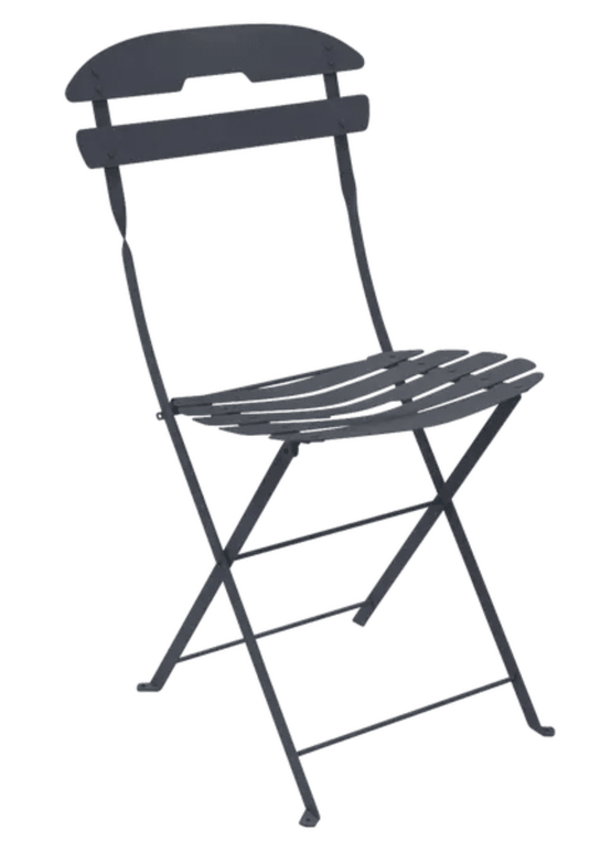 Fermob La Môme Chai folding chair in antracite color, lightweight and foldable, ideal for patio and outdoor seating.