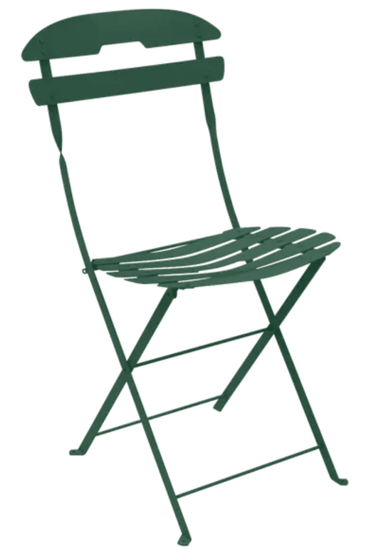 Fermob La Môme cedar green folding chair, lightweight and stylish outdoor patio furniture, shown in a foldable position.