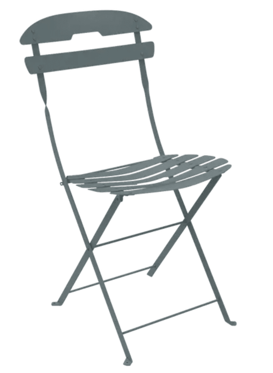 Fermob LA MÔME Storm Grey folding chair, lightweight and portable patio furniture with a modern design, shown folded.