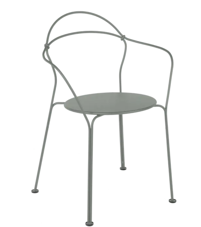 Load image into Gallery viewer, Fermob Airloop Lounge Chair in lapili grey, outdoor metal lounge chair with curved armrests and modern design.
