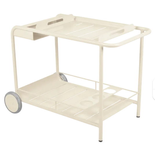 Latte beige Fermob Luxembourg Side Bar trolley with wheels, ideal for restaurant terrace drinks service, portable and stylish.
