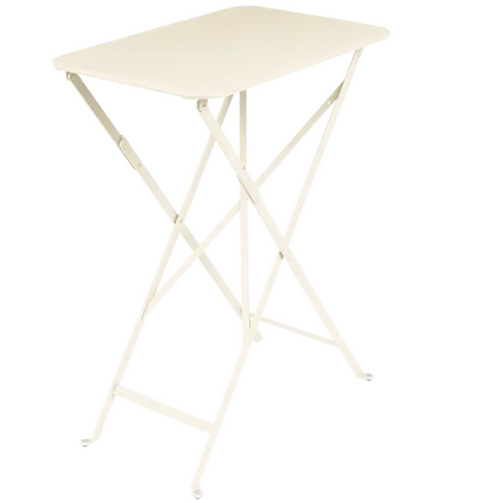Fermob Bistro folding table in latte beige with steel frame, ideal for outdoor cafes and small spaces, UV resistant.