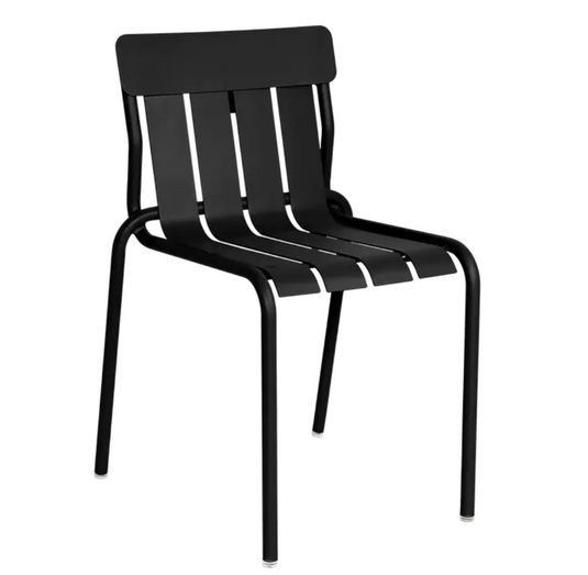 Fermob Stripe Chair, a black stackable metal outdoor dining chair with striped design, suitable for patio or hospitality settings.