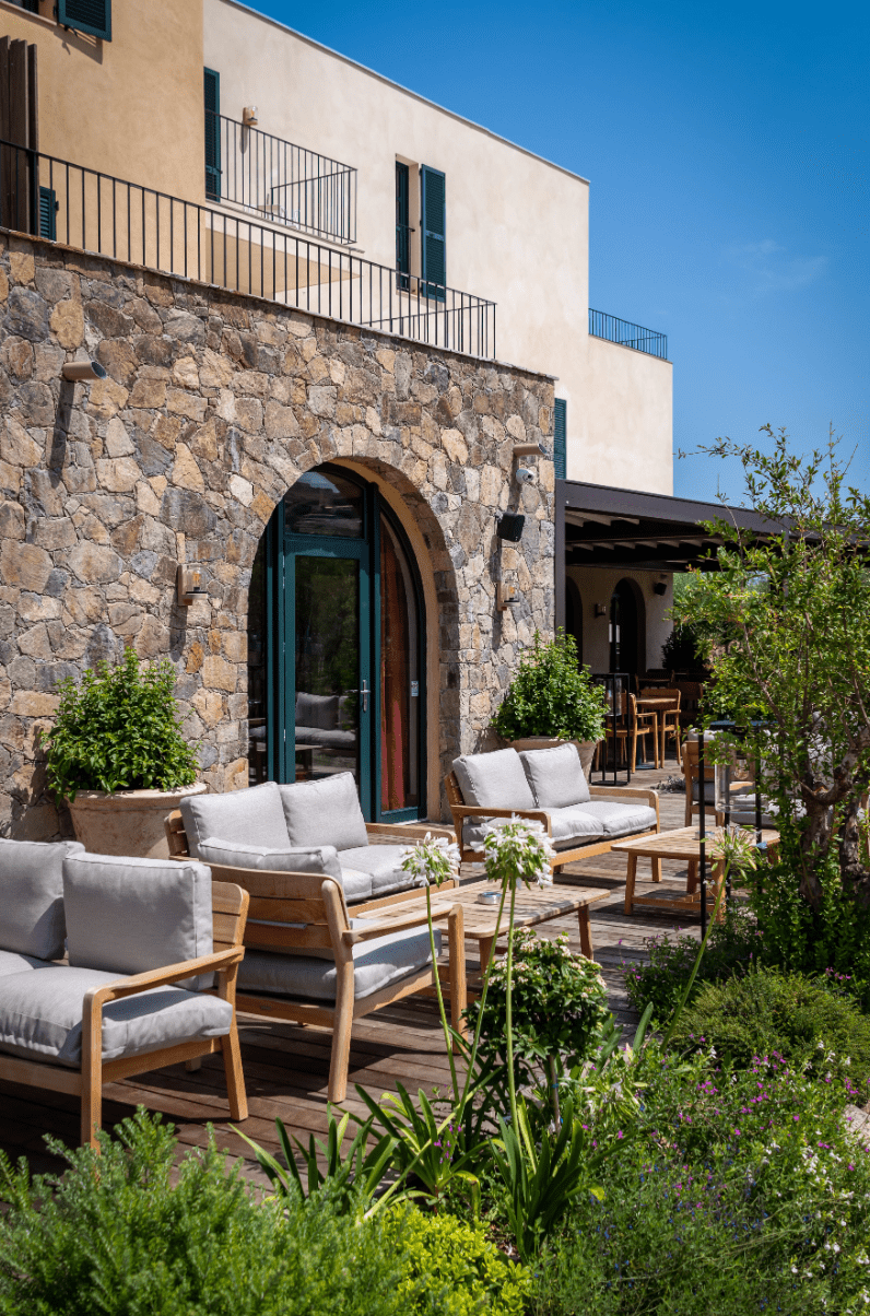 Load image into Gallery viewer, Lodge Low Armchair Teak - Custom Wood DesignsFermob Lodge outdoor teak armchair with low armrests, suitable for hotel terrace seating, featuring a stylish and durable design.Armchair Outdoor Teak24575192652279BeigeChevron
