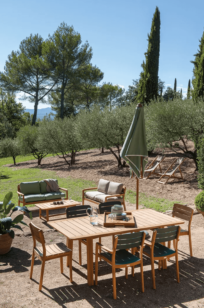 Load image into Gallery viewer, Lodge Low Armchair Teak - Custom Wood DesignsFermob Lodge Low Armchair in teak wood, outdoor luxury hotel seating with sleek design and natural teak finish.Armchair Outdoor Teak24575192652279BeigeChevron
