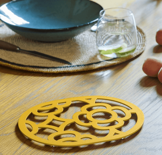 MayaBlue Fermob LORETTE non-slip metal trivet pad measuring 22x17.5 cm with a sturdy design and textured surface for stability.