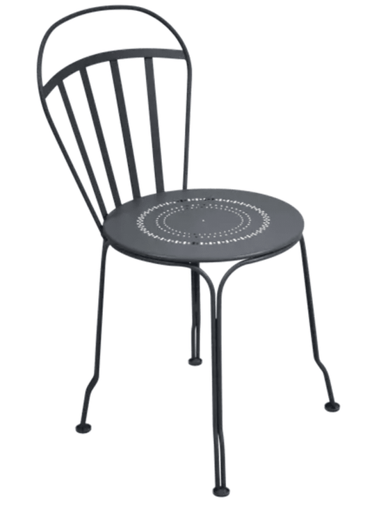 Fermob outdoor LOUVRE chair in antracite color, featuring a modern design with slatted back and armrests for outdoor seating