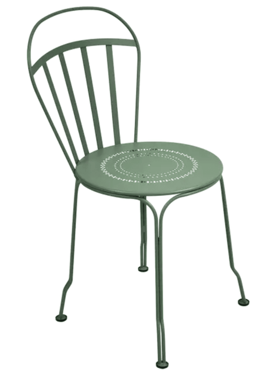 Fermob Louvre outdoor chair with a cactus green finish, featuring a modern, ergonomic design perfect for garden or patio use.