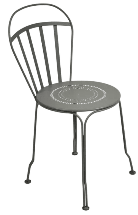 Load image into Gallery viewer, Fermob Louvre outdoor chair with a sleek design, featuring a metal frame and slatted seat in a vibrant color.

