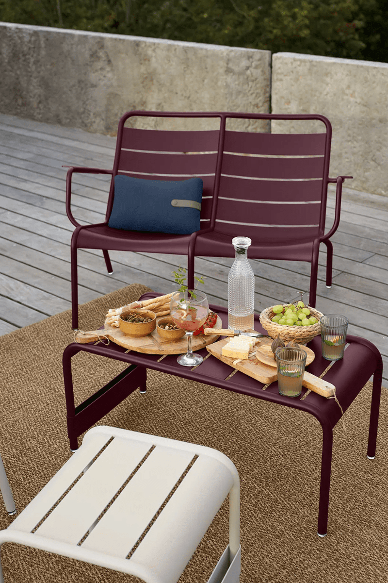 Load image into Gallery viewer, Fermob Luxembourg large low table or bench 86x44 with wooden top and metal legs, suitable for indoor or outdoor use.
