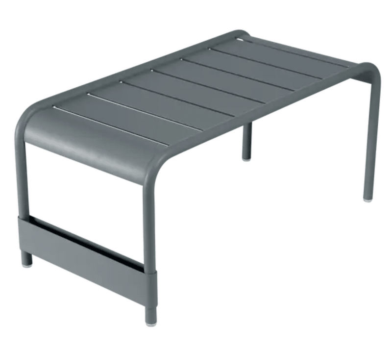 Load image into Gallery viewer, Storm grey Fermob Luxembourg large low table and bench, 86x44, with sturdy wooden top and sleek modern design.
