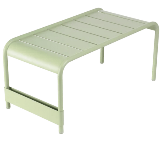 Willow green Fermob Luxembourg large low table and bench, 86x44, featuring a sleek wooden design and modern outdoor furniture style.
