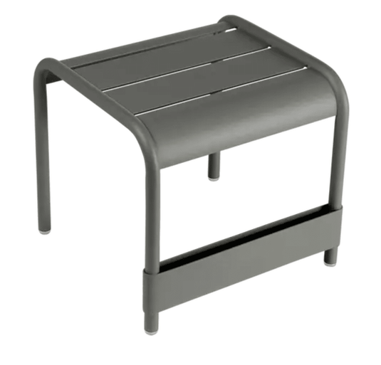 Fermob Luxembourg small low table or footrest with a 44x42 cm size, featuring a sleek, modern design in a neutral finish.