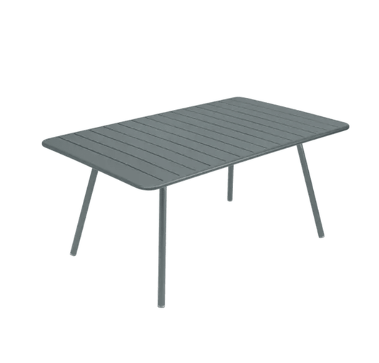 Luxembourg Table 165 x 100 cm - Custom Wood DesignsStorm grey Fermob Luxembourg metal outdoor table measuring 165 x 100 cm, displayed in a garden setting.Table Metal24575206942551AluminumStorm Grey