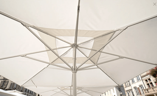 Fermob Magna Parasol Base with sturdy design for outdoor umbrellas, shown in Ireland.