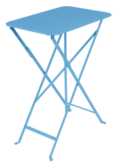 Bright blue Fermob Bistro folding table with steel frame, 57 x 37 cm, ideal for outdoor cafes and small spaces.