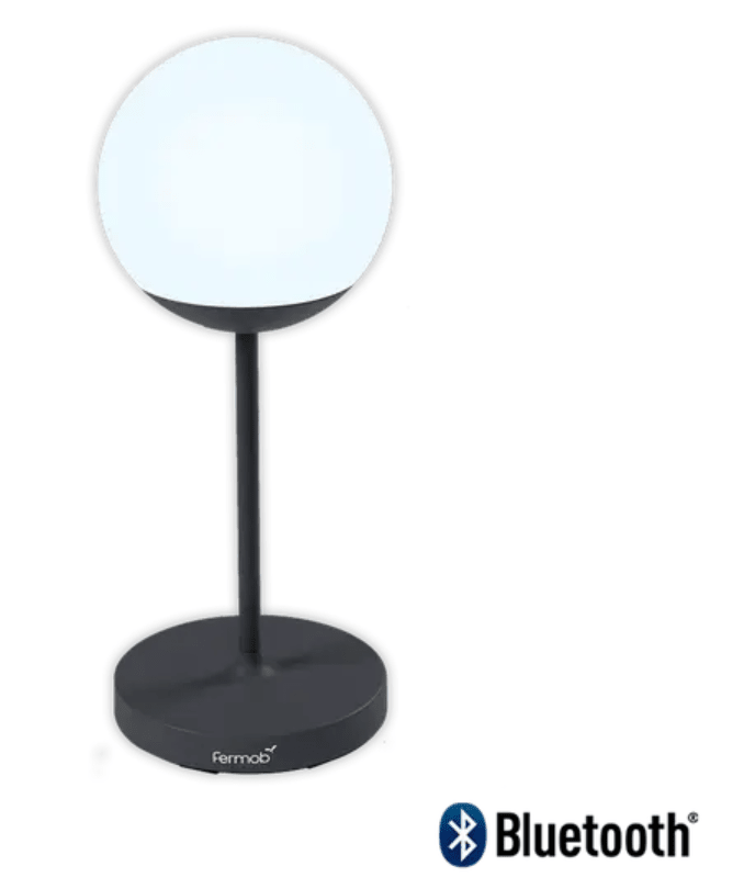 Load image into Gallery viewer, Antracite Fermob MOOON! wireless table lamp, 63 cm height, illuminated with a sleek modern design and soft glow.
