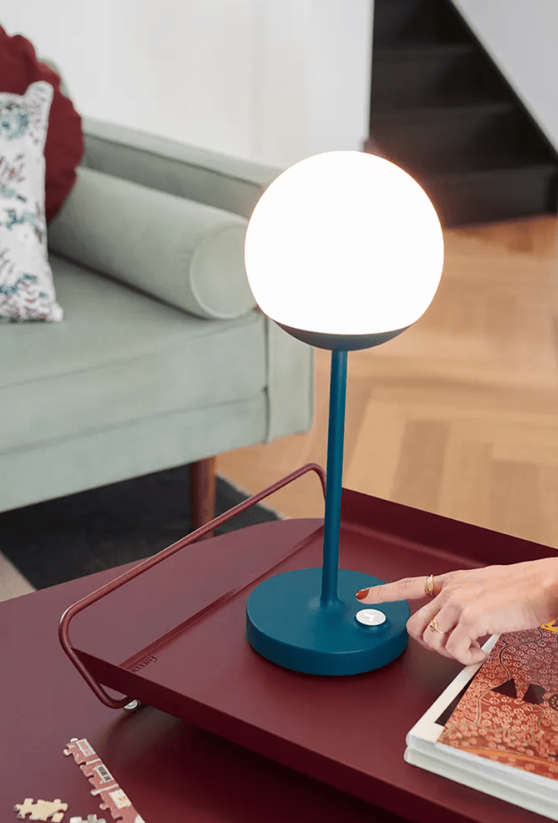 Load image into Gallery viewer, Fermob MOOON! wireless table lamp with moon design, outdoor use, compact size, and warm glowing light.
