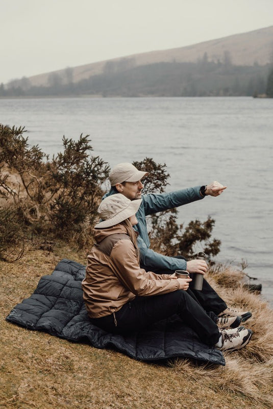 Nordic Drift GRS 3-in-1 Adventure Blanket - Custom Wood DesignsNordic Drift GRS 3-in-1 Adventure Blanket outdoors, showing versatile outdoor blanket with layered design and durable fabric.OutdoorND610.0001Nylon,Recycled polyesterblack