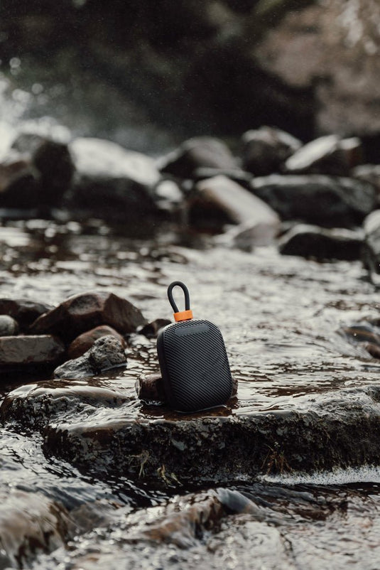 Nordic Drift Titan IP67 Water and Dustproof 5W Speaker - Custom Wood DesignsNordic Drift Titan 5W IP67 water and dustproof audio speaker showing rugged black design with control buttons.AudioND440.0001Recycled ABS,Recycled Polyurethaneblack