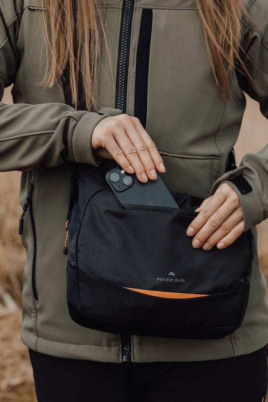 Nordic Drift Trail RCS Crossbody bag 4L - Custom Wood DesignsNordic Drift Trail RCS Crossbody Bag 4L in black, compact travel bag with adjustable strap and multiple compartments.Bags & TravelND200.0401rPET,rPETblack