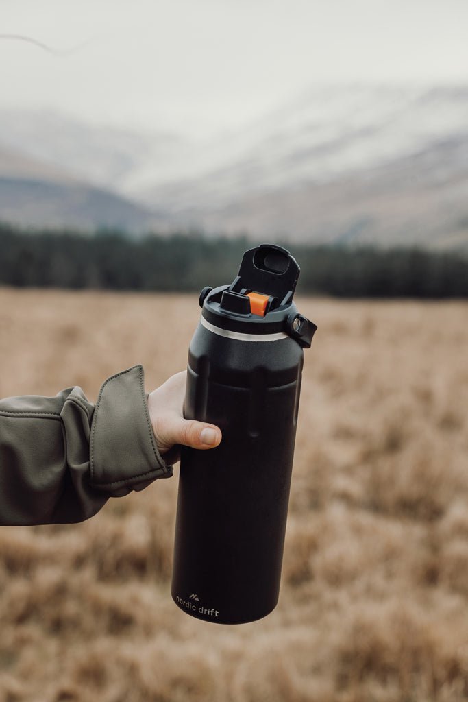 Load image into Gallery viewer, Nordic Drift Trail RCS Insulated sports bottle 940ml - Custom Wood DesignsNordic Drift insulated sports bottle 940ml in black, with a sleek design and secure lid, ideal for active hydration.DrinkwareND310.0001Recycled Stainless steel,Polypropyleneblack
