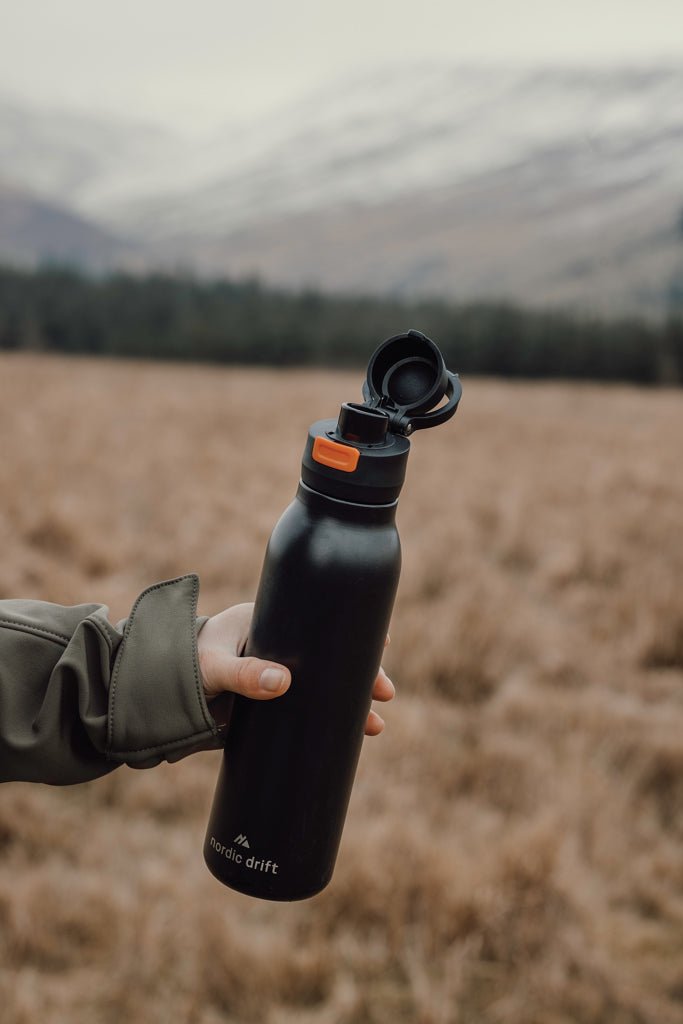 Load image into Gallery viewer, Nordic Drift Trail RCS Single Wall Water Bottle 750ml - Custom Wood DesignsNordic Drift Trail RCS 750ml single-wall water bottle in black with a screw-on lid, designed for outdoor use and hydration.DrinkwareND310.0301Recycled Stainless steelblack
