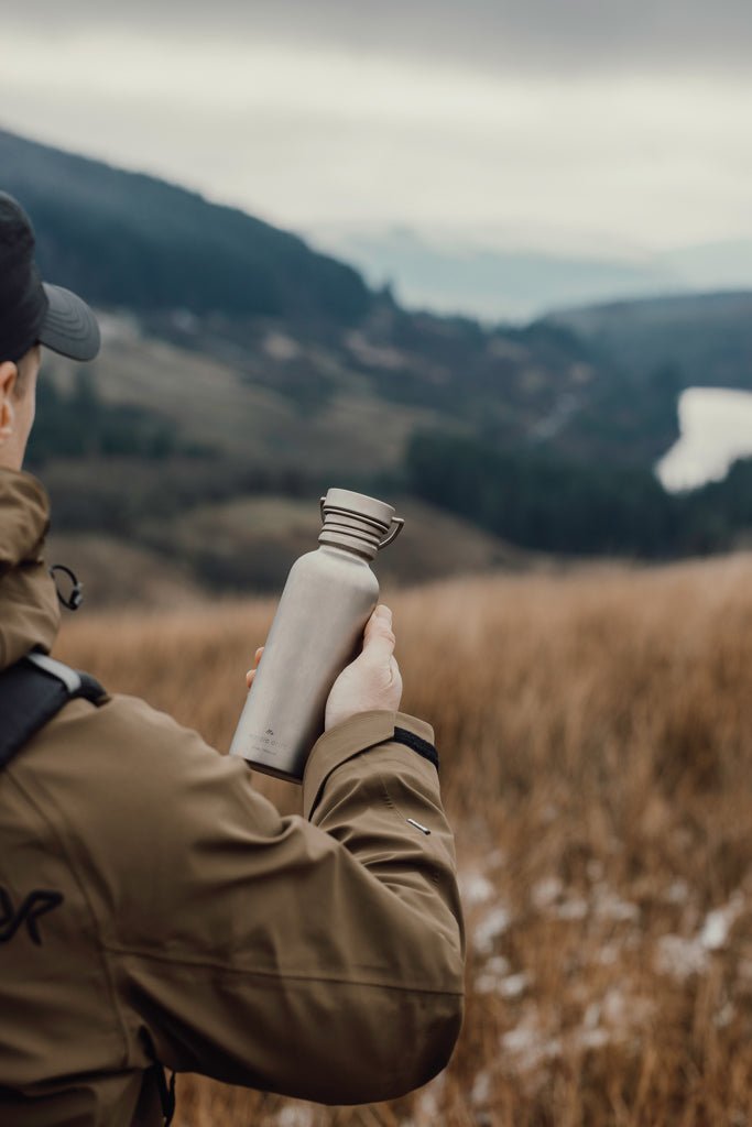 Load image into Gallery viewer, Nordic Drift Trail Ultra Light Titanium 600ml Water Bottle - Custom Wood DesignsNordic Drift ultra-light titanium 600ml water bottle for drinkware, shown with sleek metallic finish and compact design.DrinkwareND340.0002Titanium,Polypropylenesilver
