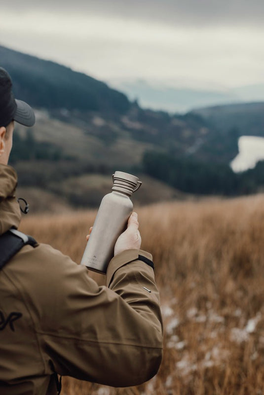 Nordic Drift Trail Ultra Light Titanium 600ml Water Bottle - Custom Wood DesignsNordic Drift ultra-light titanium 600ml water bottle for drinkware, shown with sleek metallic finish and compact design.DrinkwareND340.0002Titanium,Polypropylenesilver