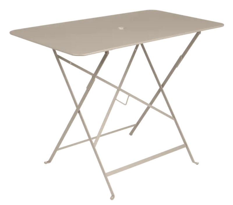 Load image into Gallery viewer, Fermob metal foldable bistro table in nutmeg beige, 97x57 cm, with a rectangular design and Parisian style.
