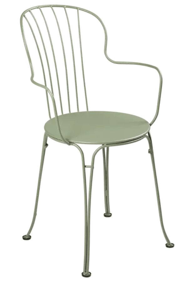 Load image into Gallery viewer, Fermob OPÉRA+ outdoor metal armchair with sleek design, featuring a cactus-themed pattern on a vibrant outdoor seating piece.
