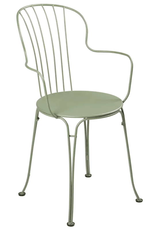 Fermob OPÉRA+ outdoor metal armchair with sleek design, featuring a cactus-themed pattern on a vibrant outdoor seating piece.