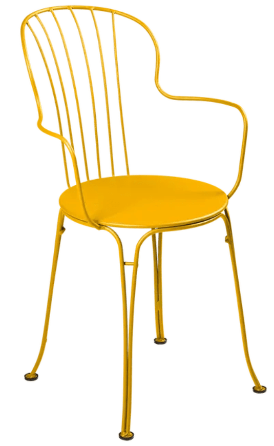 Honey-colored Fermob OPÉRA+ outdoor metal armchair with sleek design and armrests, perfect for patio or garden seating.