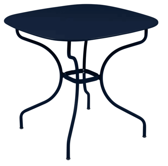 Deep blue Fermob OPÉRA+ Carronde outdoor metal table, 82x82 cm, perfect for garden or patio dining and outdoor gatherings.
