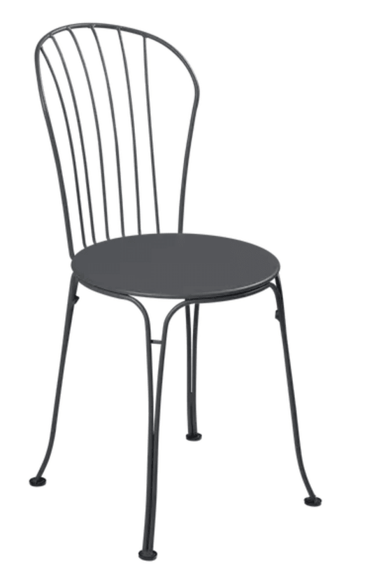 Fermob OPÉRA+ outdoor metal chair in antracite color, featuring a sleek design suitable for patio or restaurant seating.