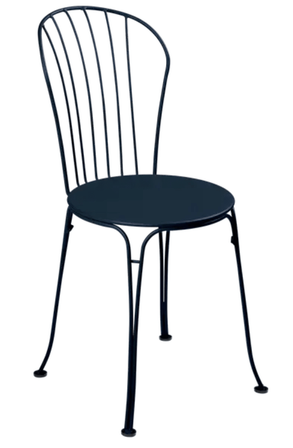 Load image into Gallery viewer, Deep blue Fermob OPÉRA+ metal outdoor chair with curved armrests and slatted seat, suitable for restaurant or patio seating.
