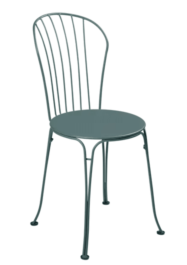 Load image into Gallery viewer, Fermob OPÉRA+ outdoor metal chair with curved backrest and armrests, designed for stylish patio or restaurant seating.
