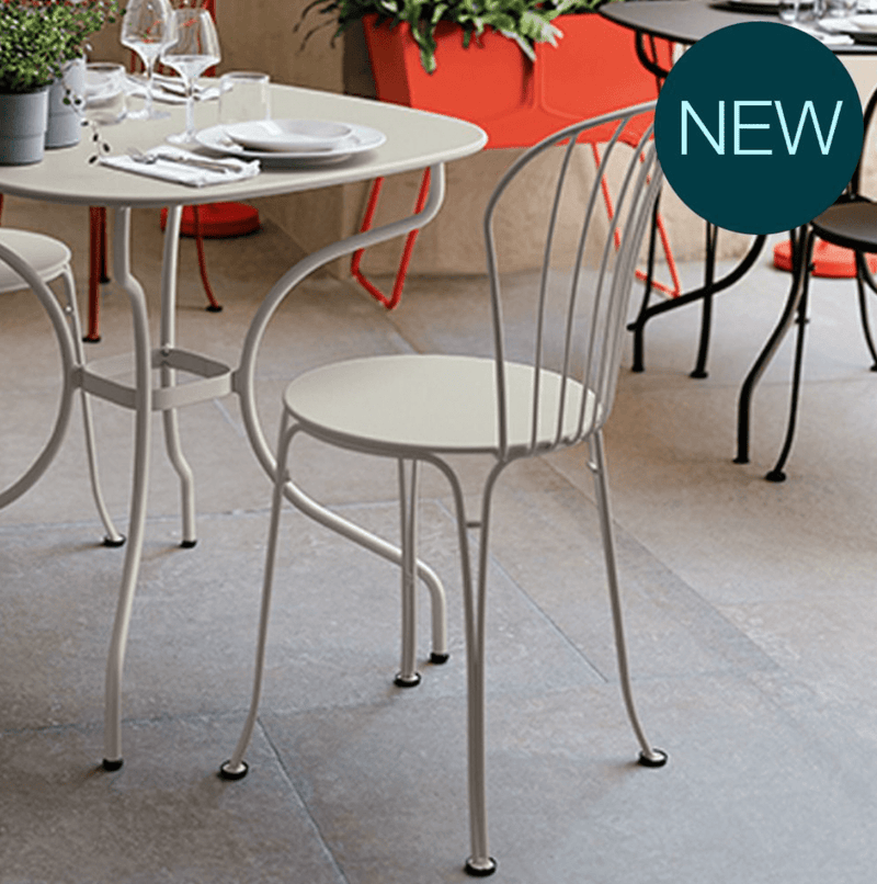 Load image into Gallery viewer, Fermob OPÉRA+ outdoor metal chair with curved backrest and armrests, suitable for patio or garden seating.

