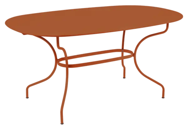 Load image into Gallery viewer, Fermob OPÉRA+ oval metal outdoor table, 160x90 cm, six-seater with a vibrant candied orange finish.
