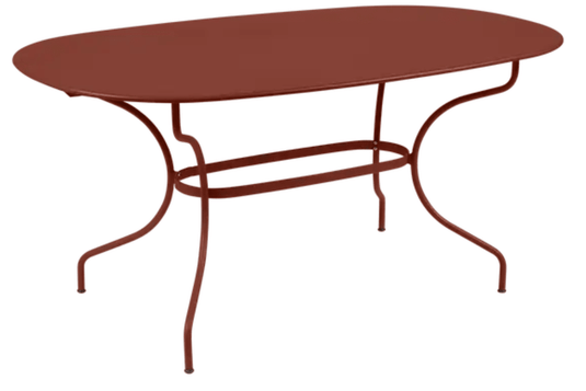 Red Ochre Fermob OPÉRA+ oval outdoor table, 160 x 90 cm, six-seater metal dining table with sleek design.