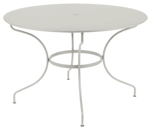 Fermob OPÉRA+ outdoor metal table in Clay Grey with 117 cm diameter, six-seater garden dining table.