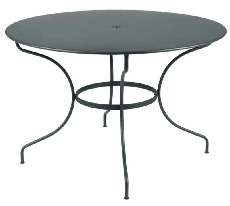 Load image into Gallery viewer, Fermob OPÉRA+ outdoor metal table in Storm Grey, 117 cm diameter, six-seater with a sleek, modern design for outdoor dining.
