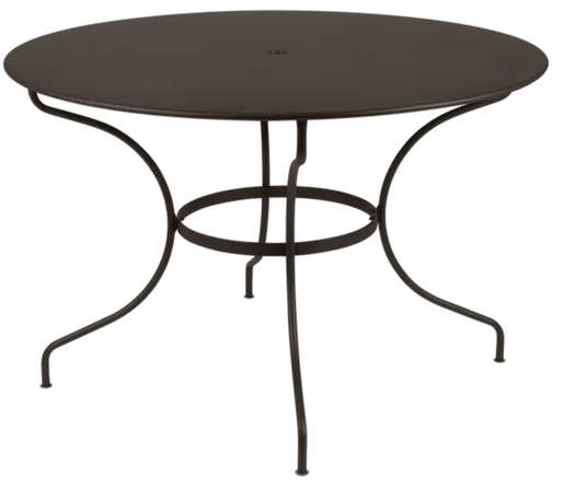 Fermob OPÉRA+ outdoor metal table, 117 cm diameter, six-seater, black finish, suitable for garden or patio dining.