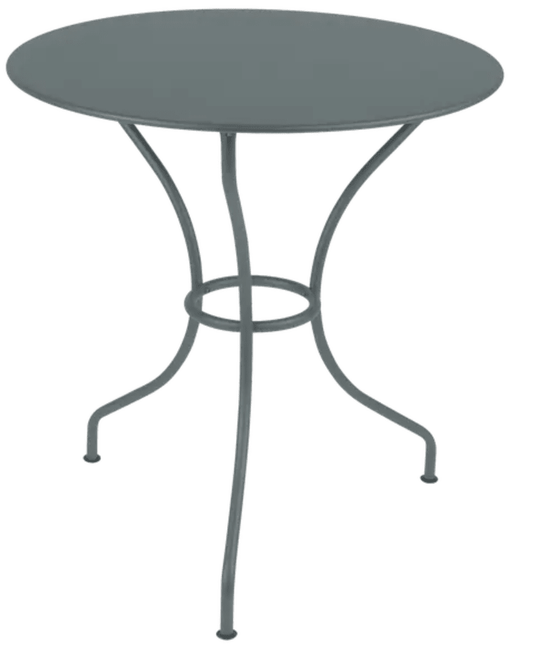 StormGrey Fermob OPÉRA+ outdoor metal table with 67cm diameter, suitable for patio or restaurant outdoor seating.